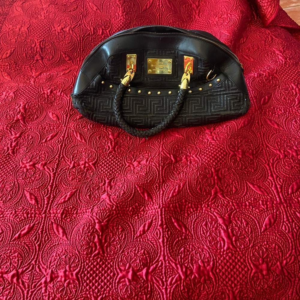 Peeling pleather purse